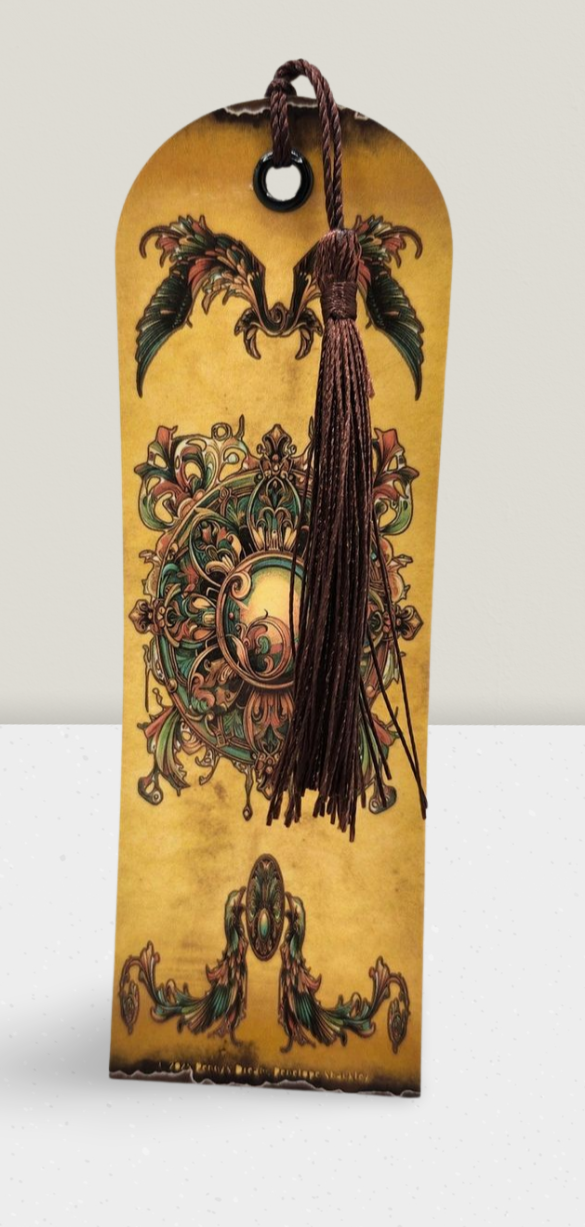 Decorative bookmark with intricate designs and a tassel on a white background