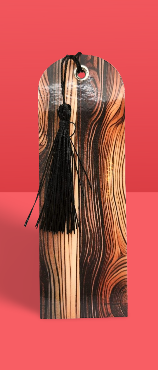 bookmark with black tassel on a red background