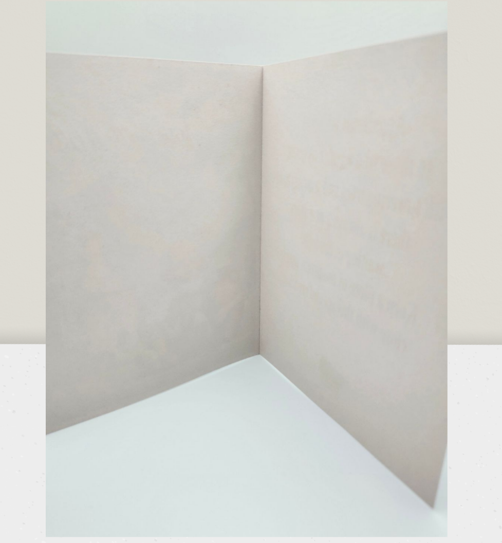 Corner of a room with beige walls and a white floor