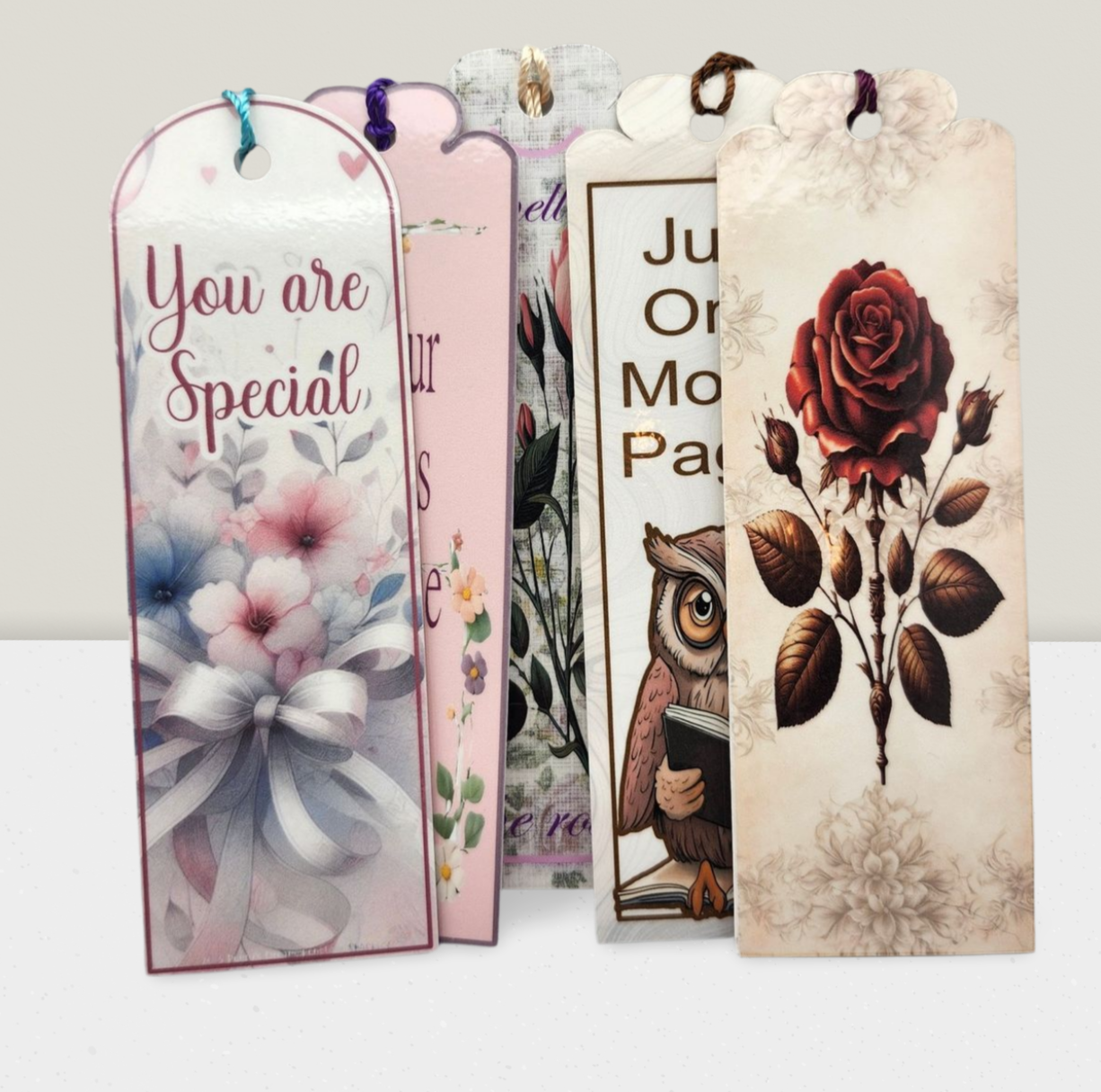 Set of decorative bookmarks with various designs on a white background