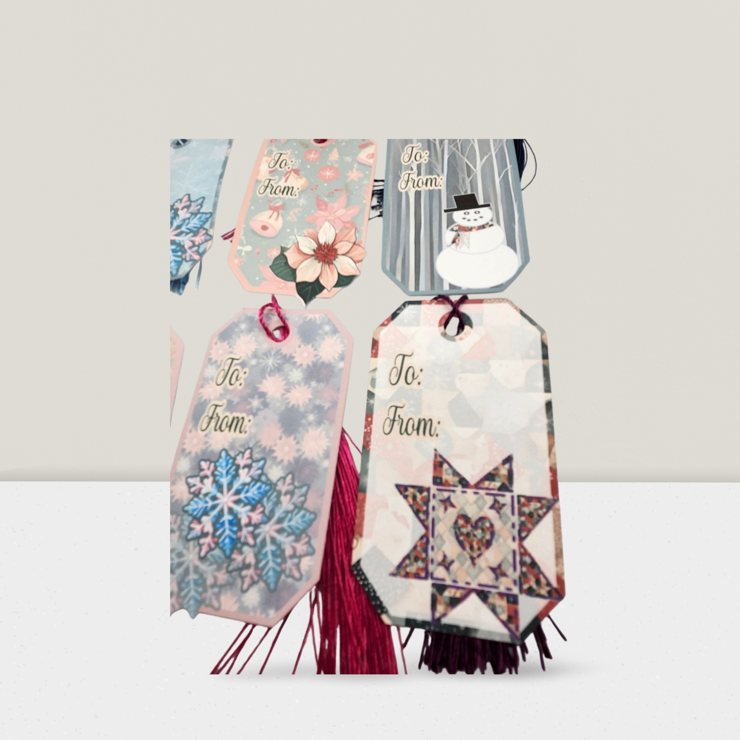 Decorative gift tags with festive designs on a white background