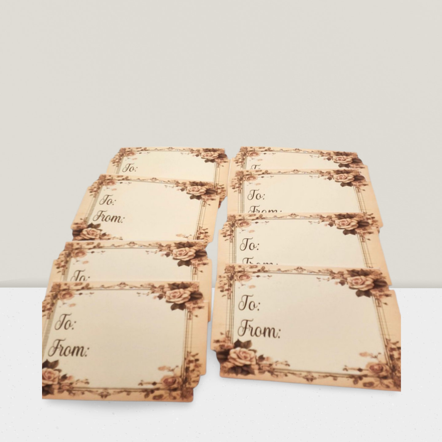 Set of gift tags with 'To' and 'From' fields on a white background