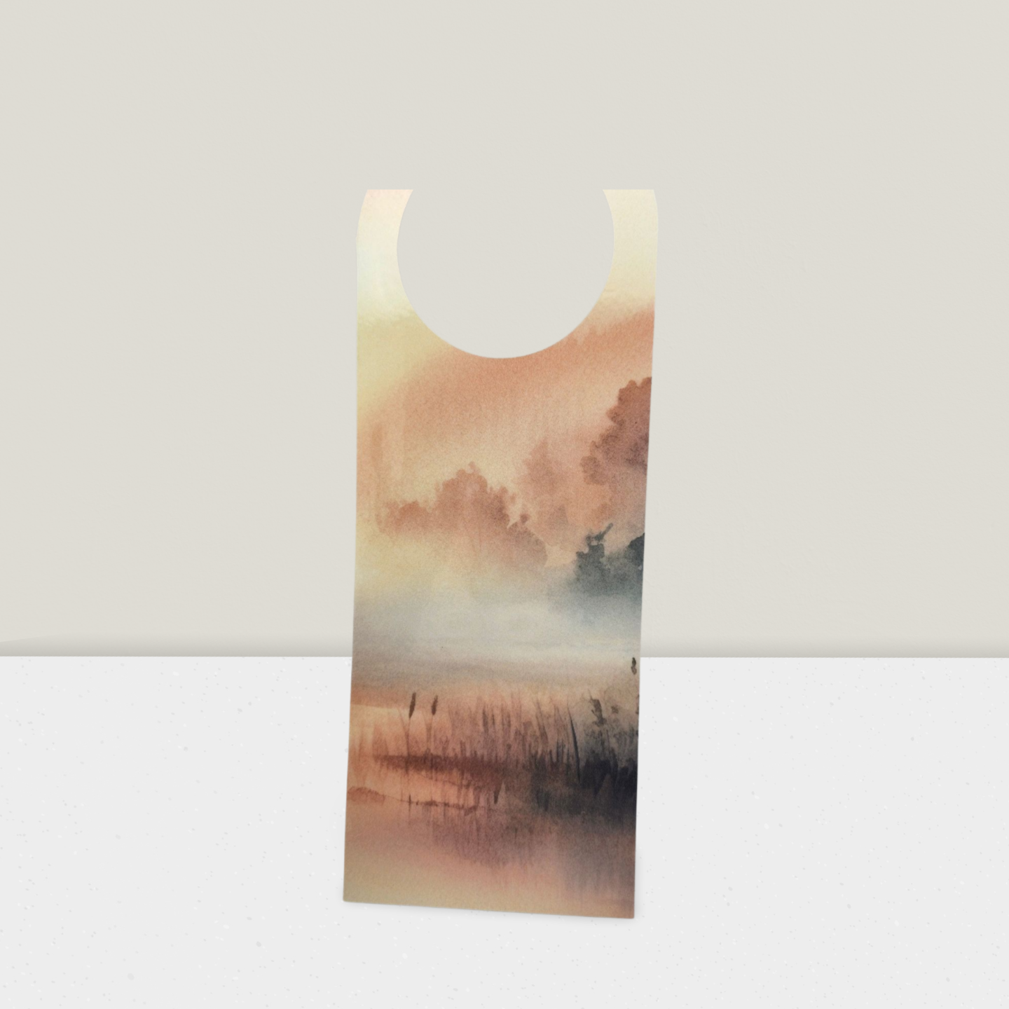 Tote bag with a scenic design of a lake and trees on a plain background