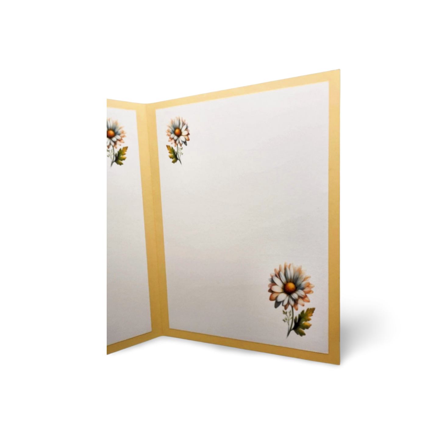 Folded card with floral designs on a white background