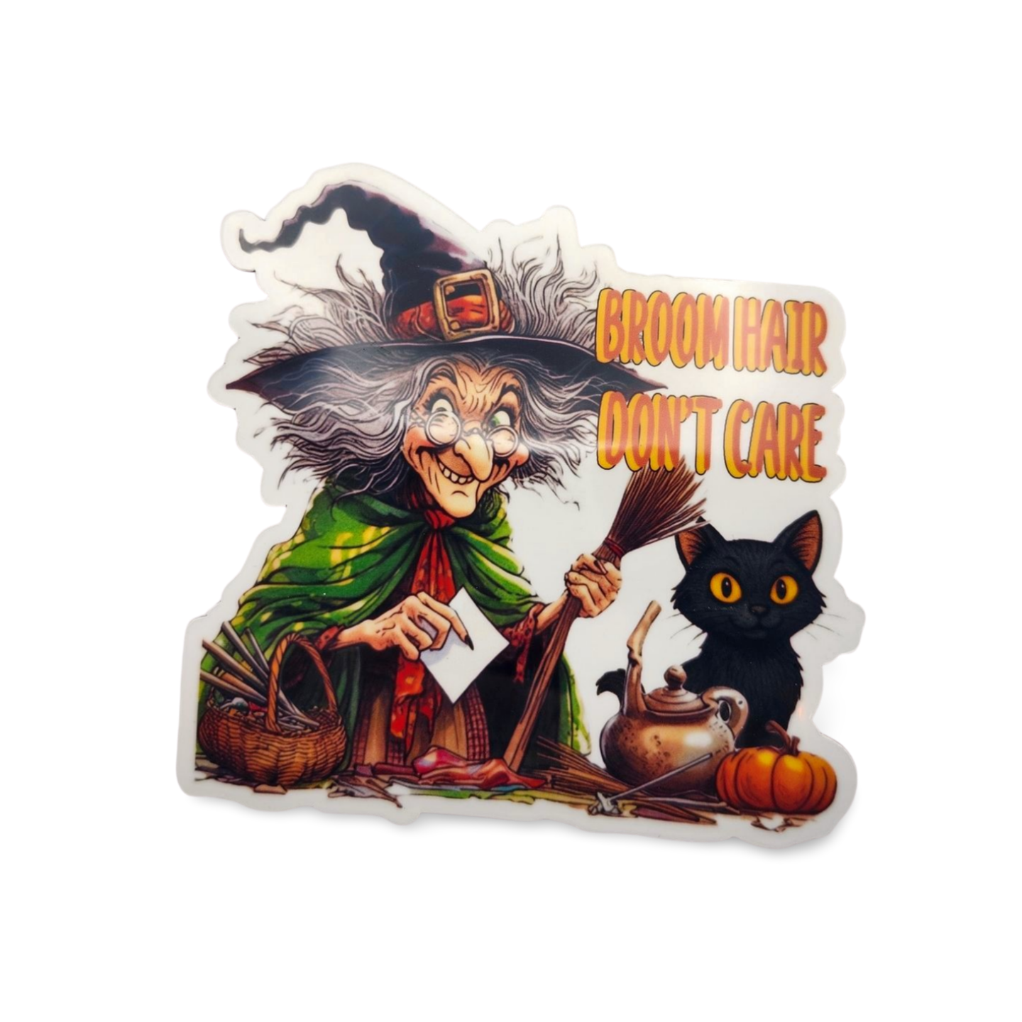 Halloween-themed magnet with a witch and black cat, featuring text 'Broom Hair Don't Care'.