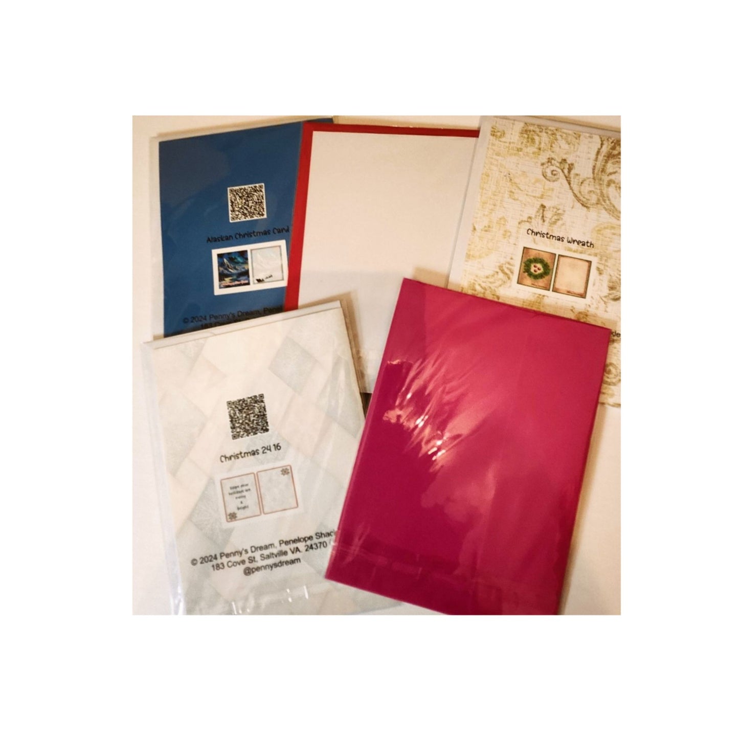Collection of envelopes with visible branding and design elements on a white background