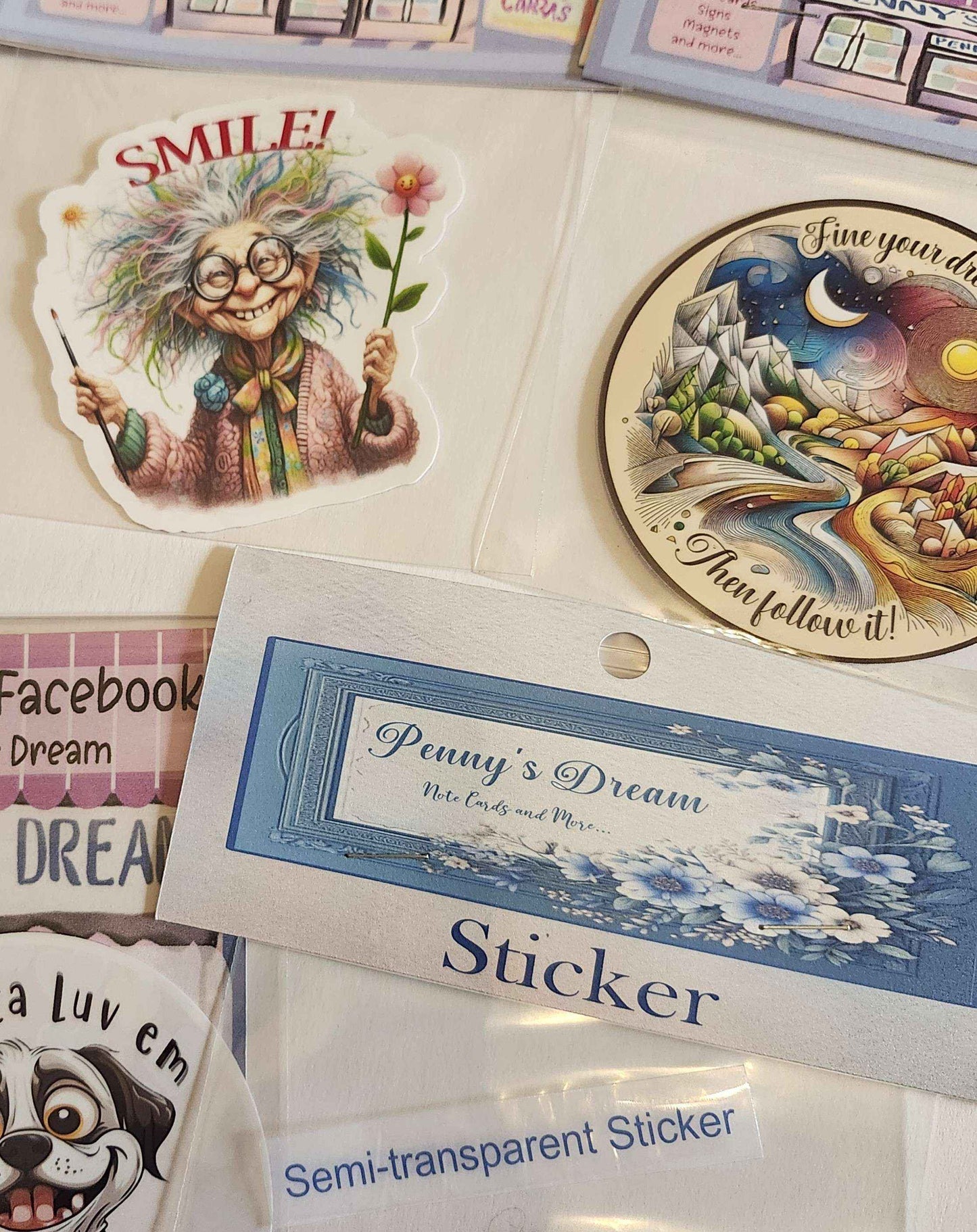 Collection of stickers with artistic designs and text on a white background