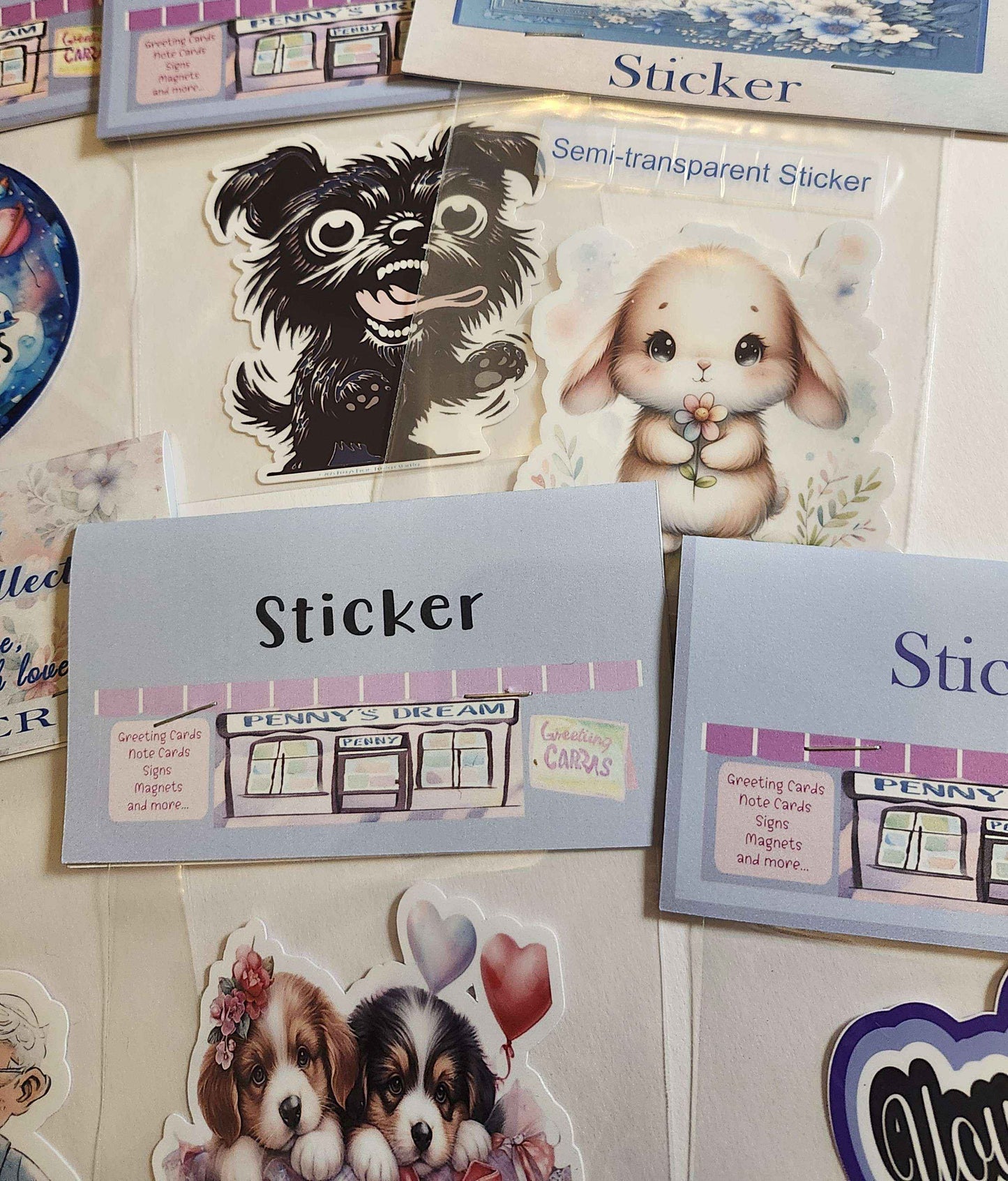 Collection of stickers featuring animals and buildings on a textured surface.