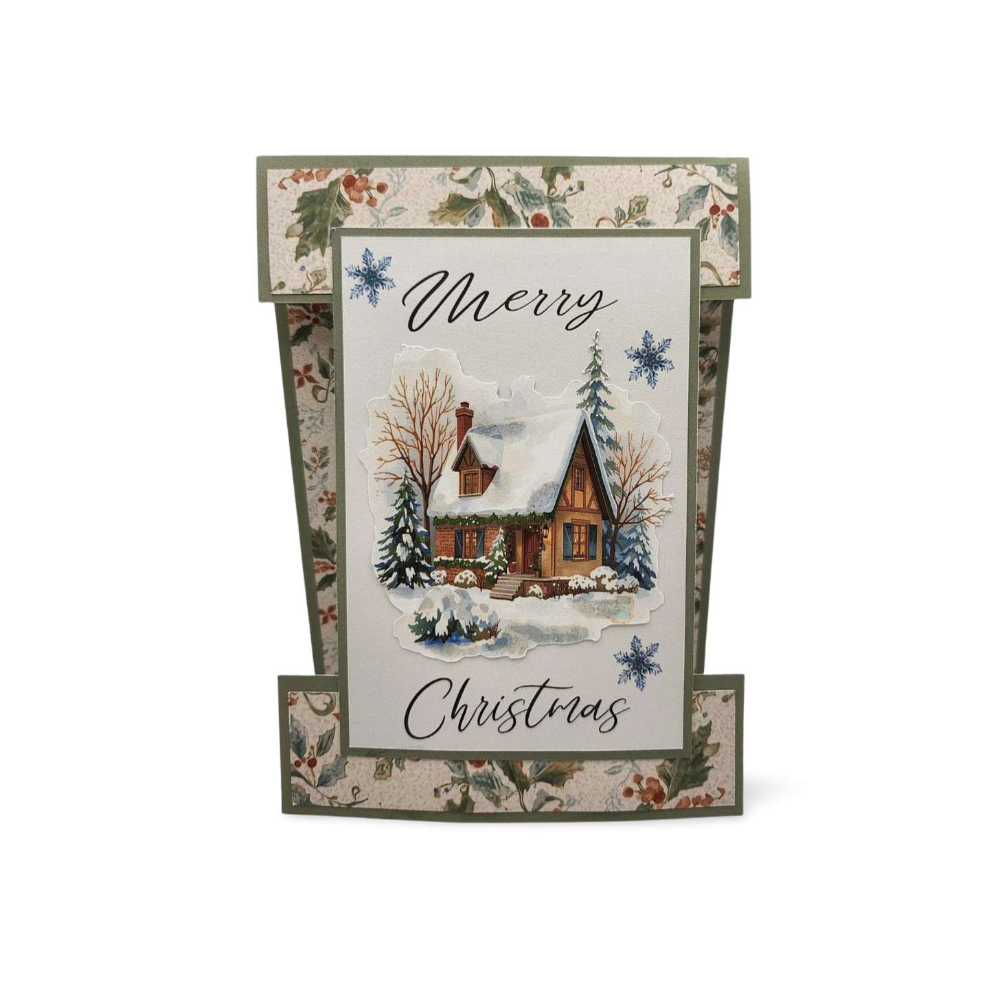 Christmas card with a snowy landscape and 'Merry Christmas' text, surrounded by decorative elements.