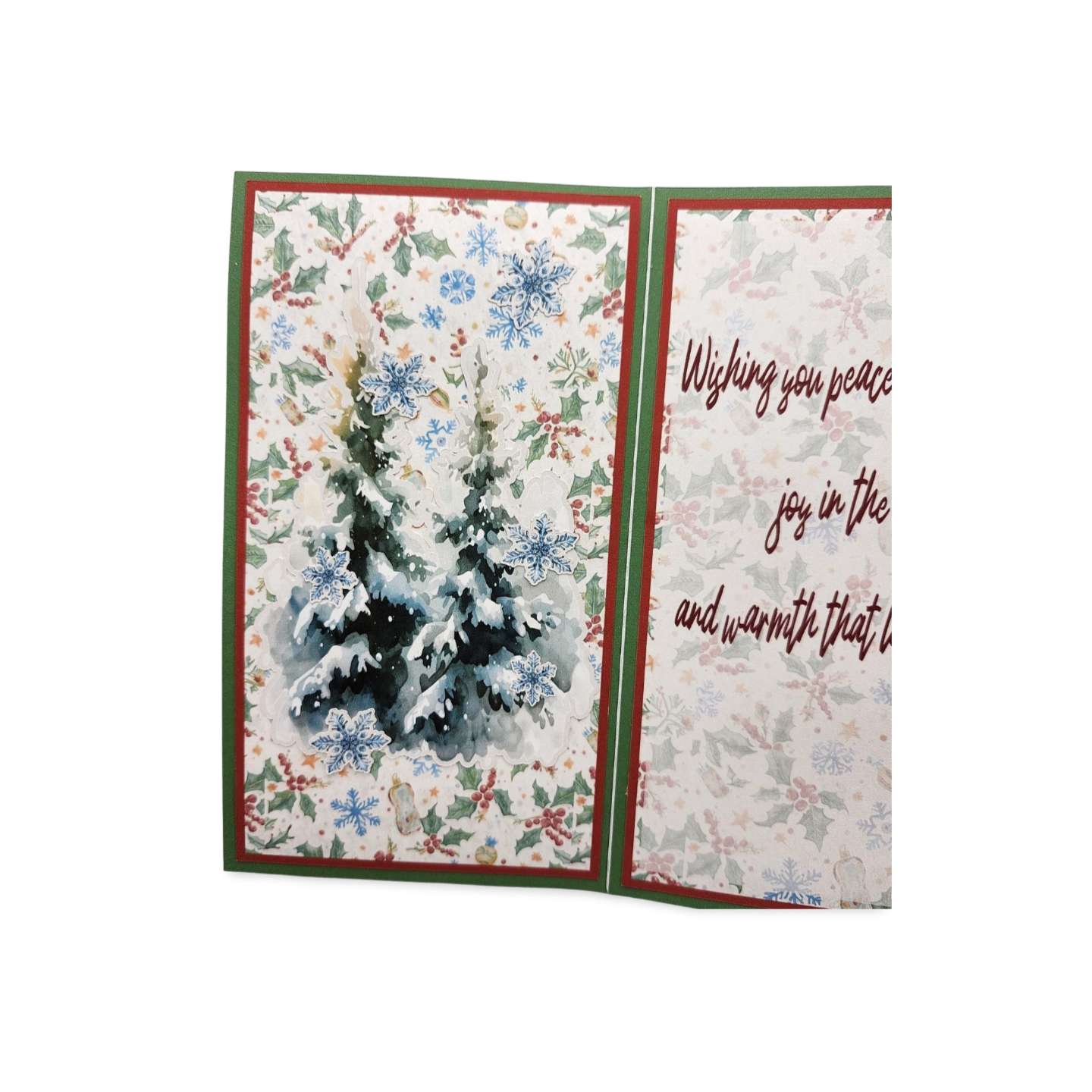 Christmas card with snowy tree design and text on a white background