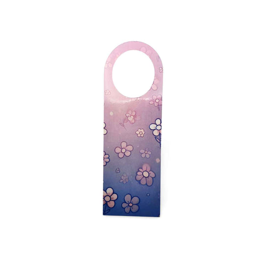 Decorative door hanger with floral pattern on a white background