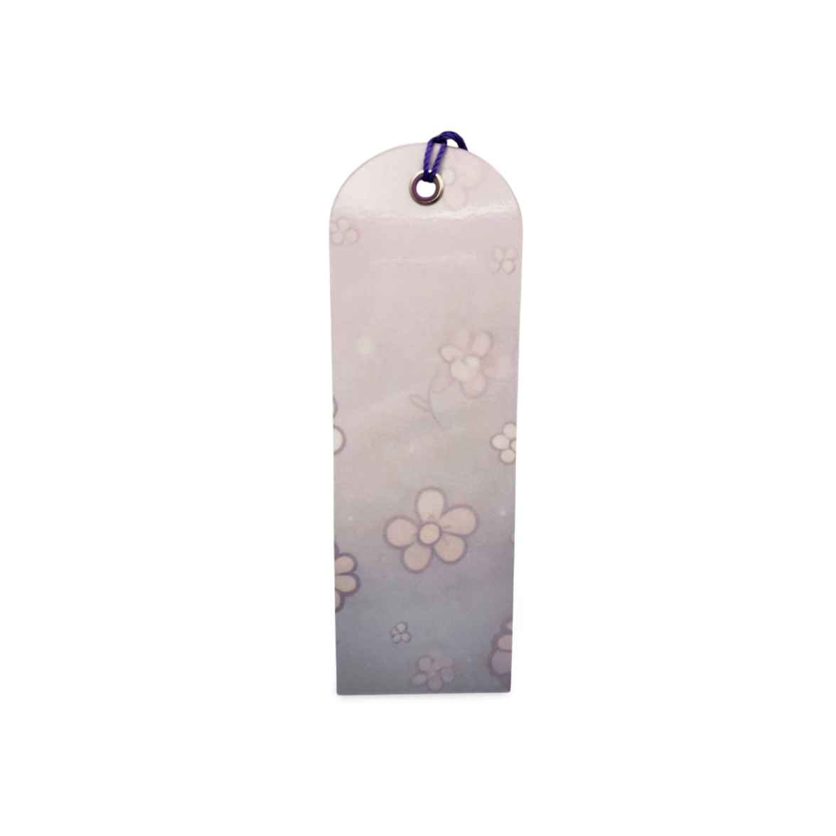 Floral-patterned pouch with a purple clip on a white background