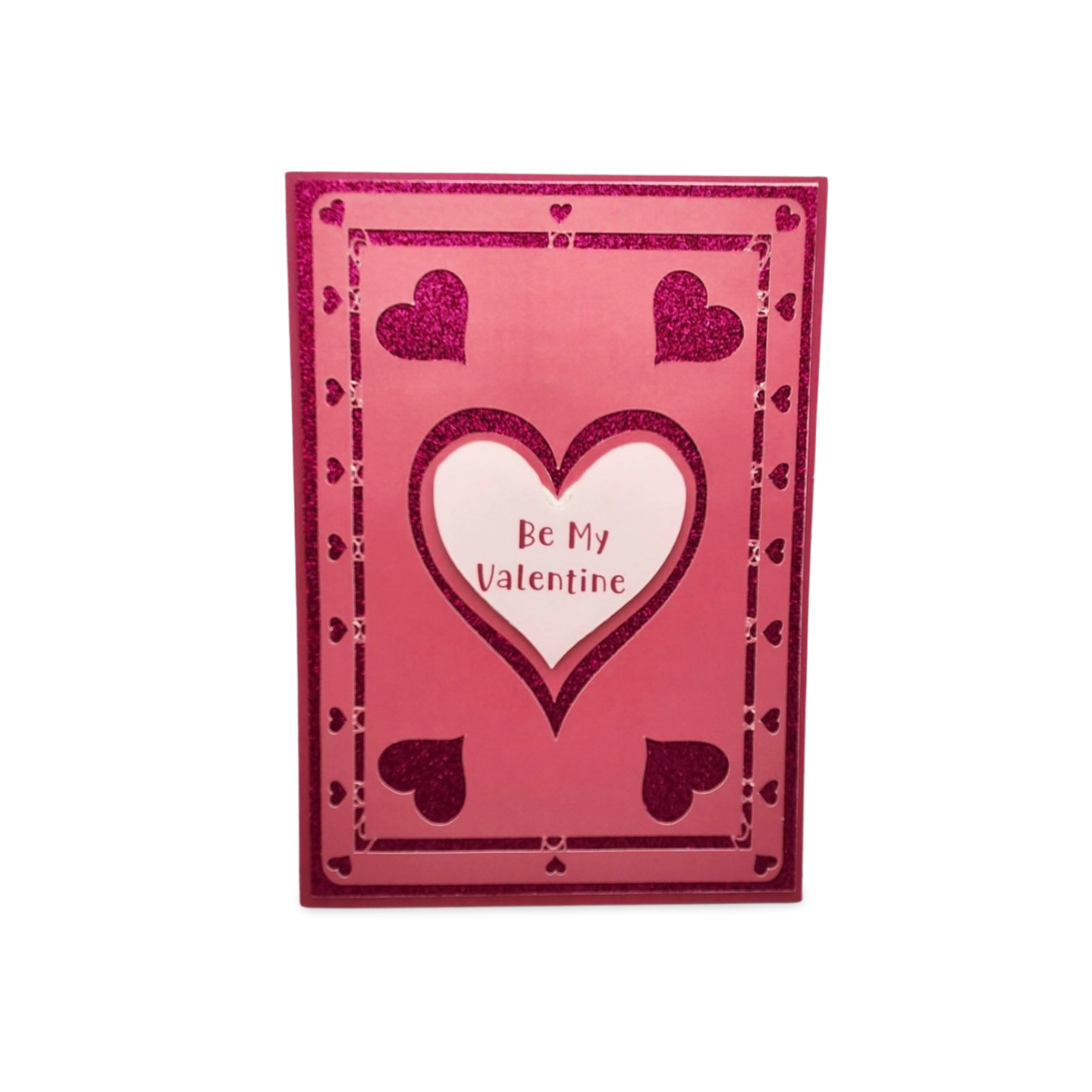 Valentine's Day card with a pink border and heart design on a white background