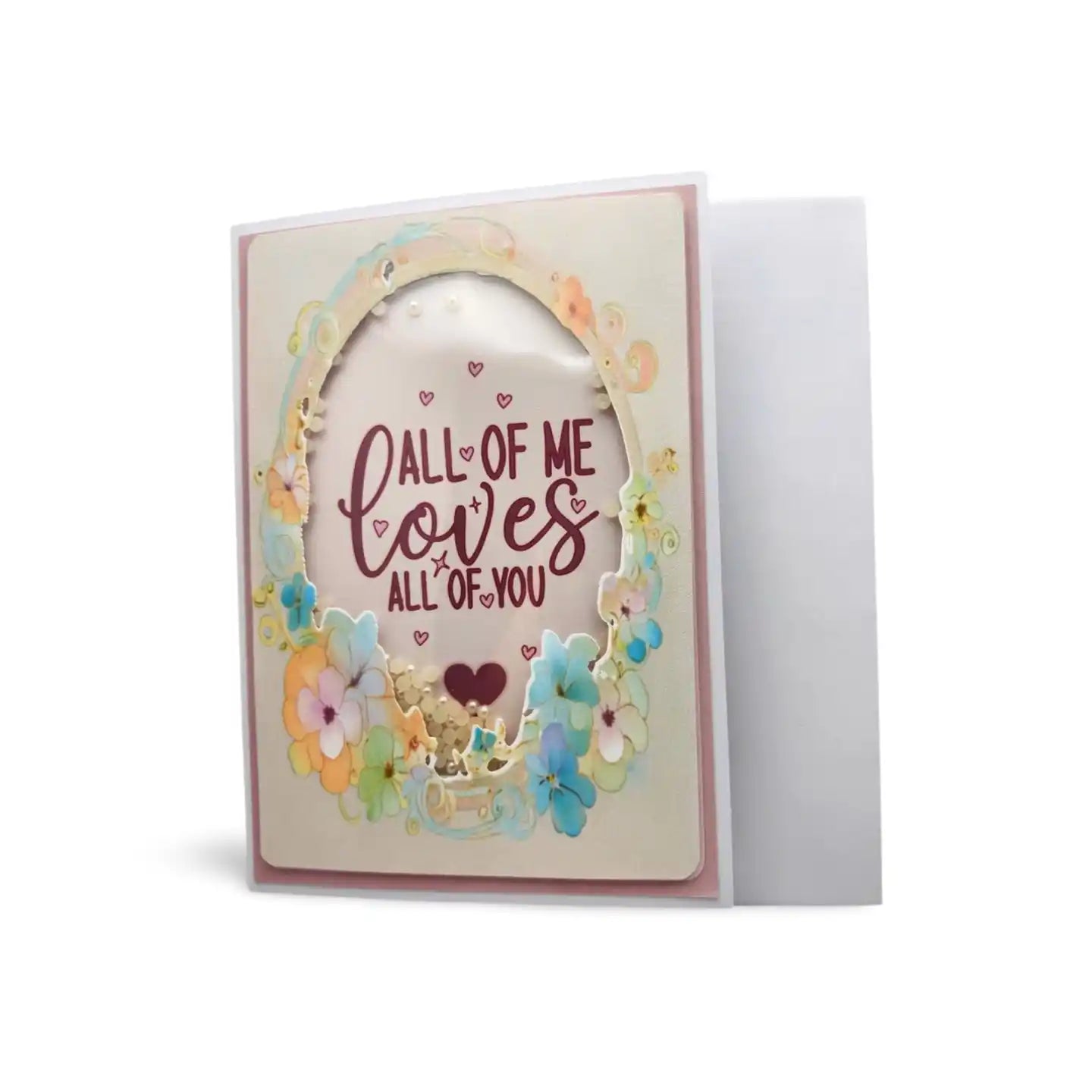 Greeting card with floral design and text 'All of Me loves all of You' on a white background