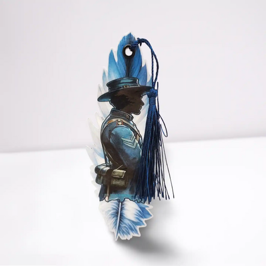 Decorative item with a silhouette of a person wearing a hat and a blue feather, on a white background.