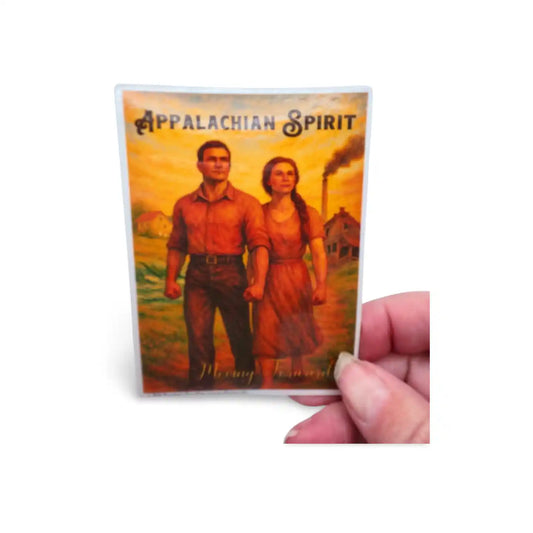 Card featuring 'Appalachian Spirit' with a couple and a mountain in the background, held by a hand.