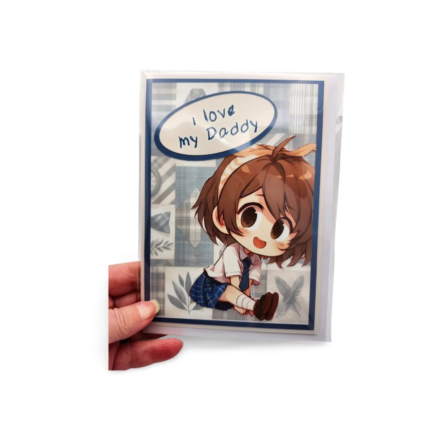 Card with cartoon character holding a heart and 'I love my Daddy' text, held by a hand on a white background.