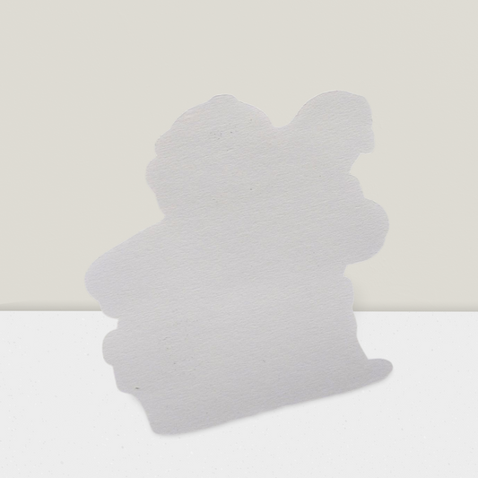 White bunny-shaped object on a light gray background