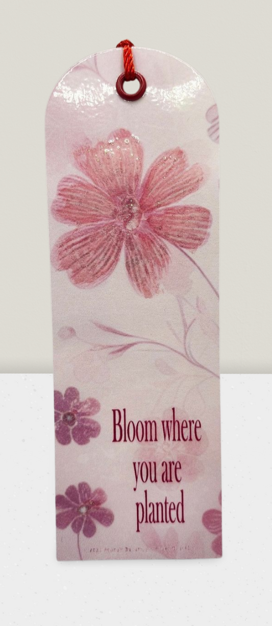 Floral bookmark with 'Bloom where you are planted' text on a white background