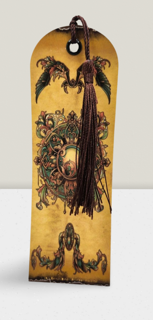 Decorative bookmark with intricate designs and a tassel on a white background