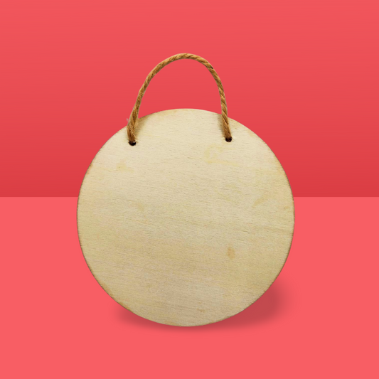 Round wooden sign with a string on a red background