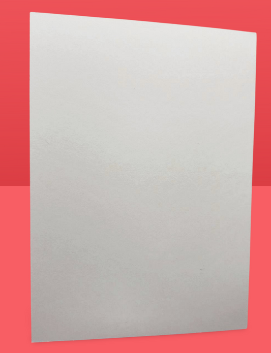 White sheet of paper on a red background