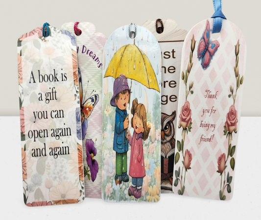 Decorative bookmarks with illustrations and text on a white background