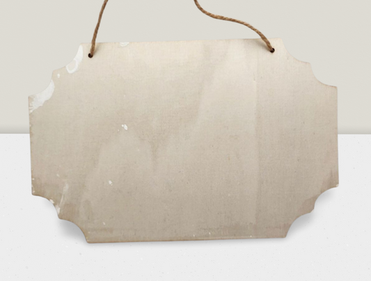 Blank wooden sign with a string for hanging on a white background