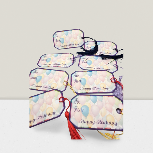 Set of decorative gift tags with floral designs and 'Happy Birthday' text on a white background.