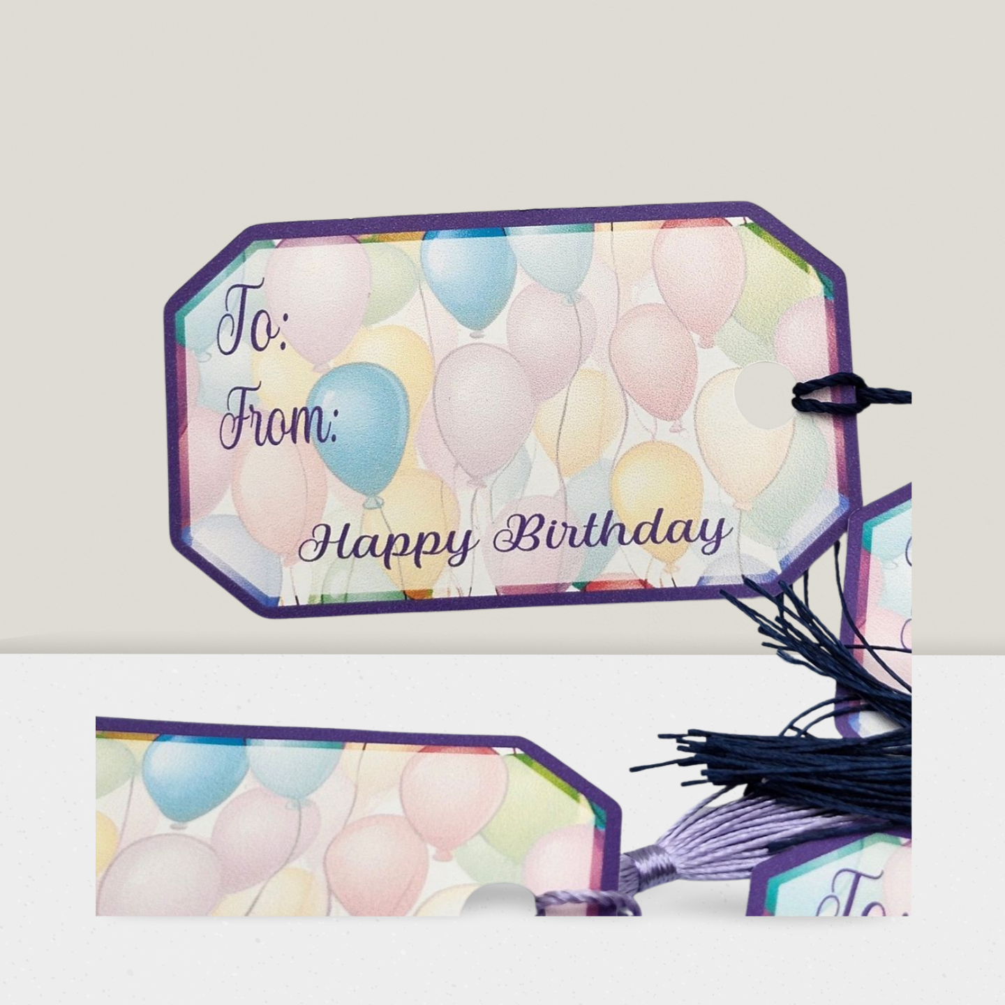 Gift tag with colorful balloons and 'Happy Birthday' text on a white background