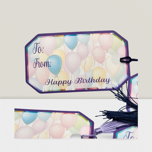 Gift tag with colorful balloons and 'Happy Birthday' text on a white background