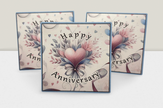 Three 'Happy Anniversary' cards with floral and heart designs on a white background
