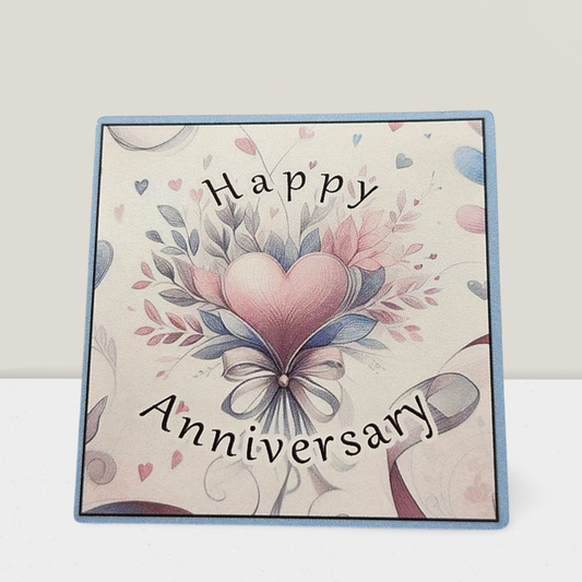 Card with heart design and 'Happy Anniversary' text on a light background