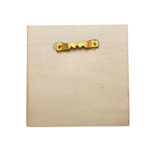 Beige wooden box with a gold handle on a white background