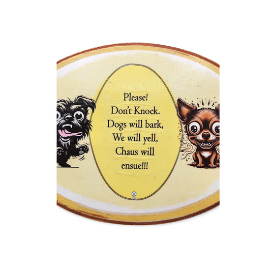 Decorative sign with cartoon dogs and humorous text on a yellow background