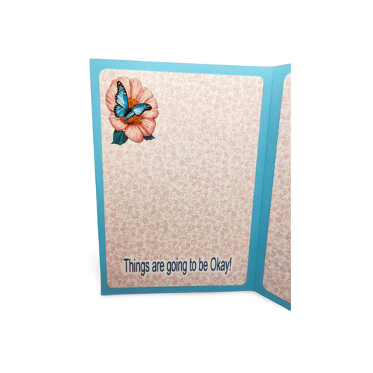 Card with a butterfly and flower design on a blue border, featuring the text 'Things are going to be okay!'.