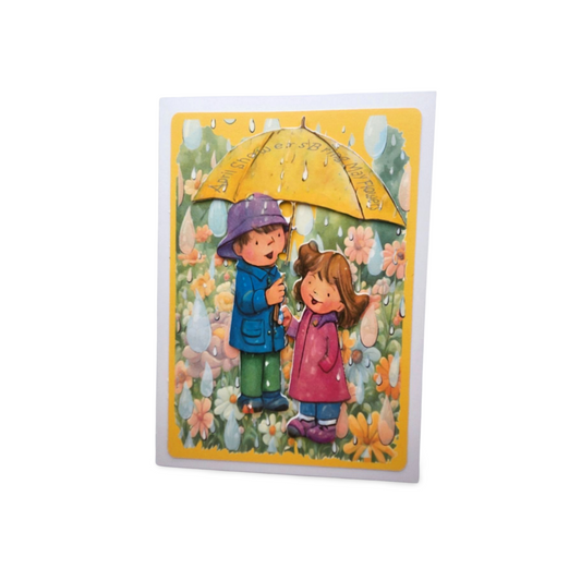 Card with illustration of two children holding a yellow umbrella in a garden setting.
