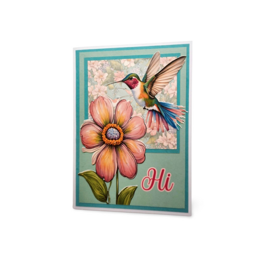 Card with a colorful flower and hummingbird illustration, featuring the word 'Hi'.