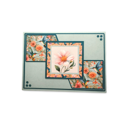 Floral design with a central pink flower on a decorative card