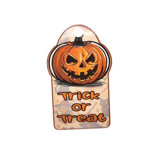 Halloween-themed tag with a jack-o'-lantern design and 'Trick or Treat' text on a white background.