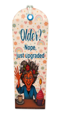 Cartoon character with text 'Older? Nope, just upgraded' on a colorful background
