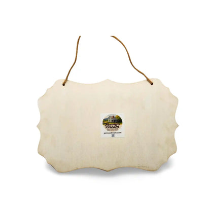 White wooden sign with a label on a white background