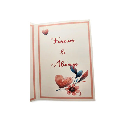 Card with 'Forever & Always' text and floral designs on a white background