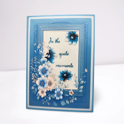 Decorative card with blue and white flowers and text on a white background