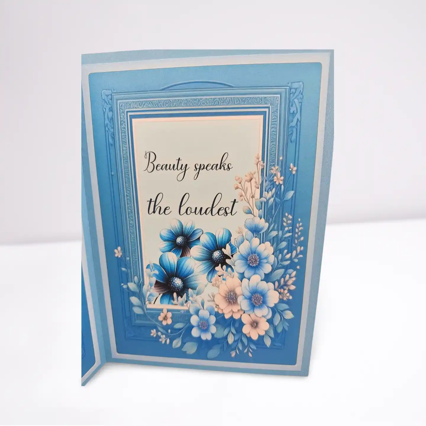 Decorative card with floral design and text on a white background