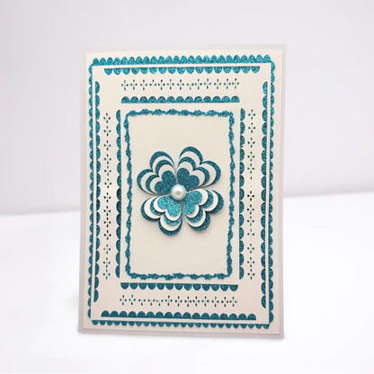 Card with decorative flower and pearl on a white background