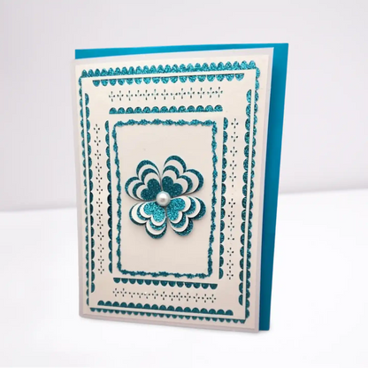 Decorative card with a blue flower design on a white background