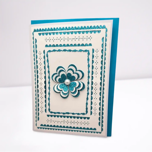 Decorative card with a blue flower design on a white background