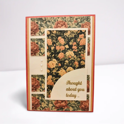 Floral patterned card with 'Thought about you today' message on a white background