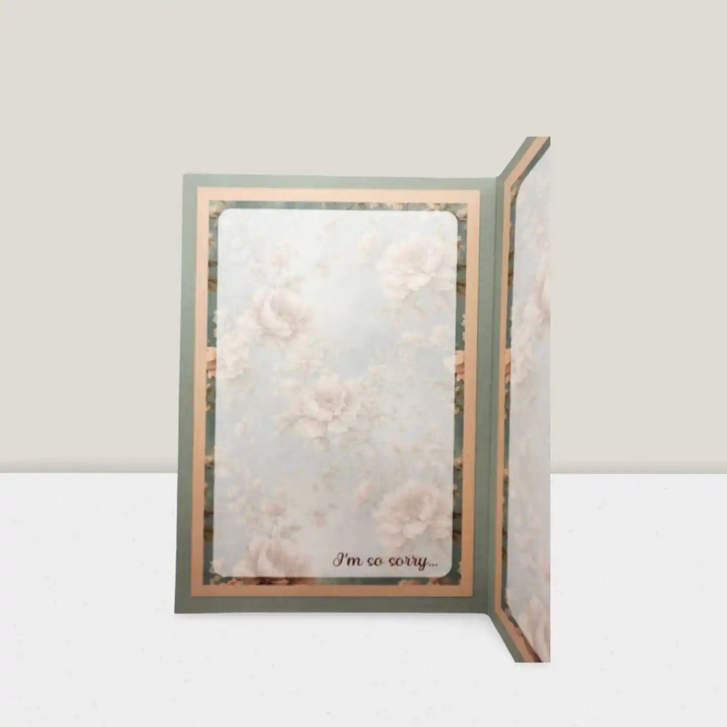 Card with floral design and 'I'm so sorry' text on a light gray background